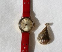 A Lady's 9ct gold Avia incablock wristwatch with a silvered dial and batons,