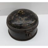 A 19th century toleware spice container, the circular lid enclosing a six division interior,