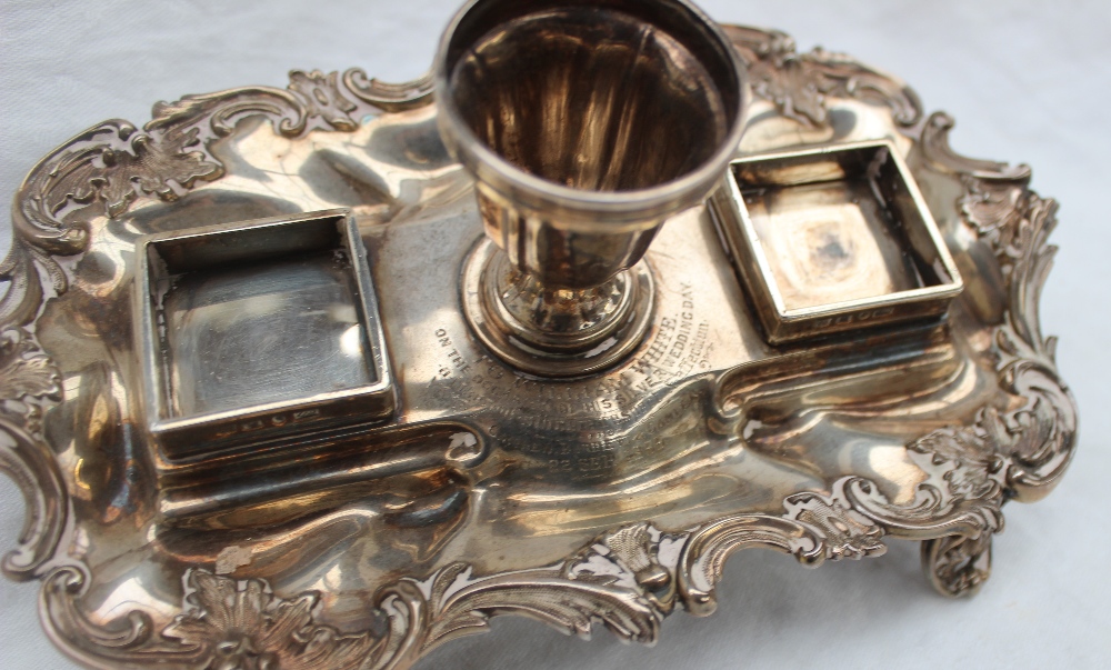 A late Victorian silver desk standish, with a central urn and two glass and silver topped inkwells, - Image 3 of 5