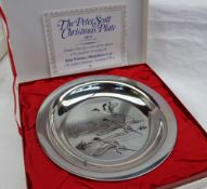 An Elizabeth II silver Peter Scott Christmas Plate 1972, decorated with ducks in flight, London,