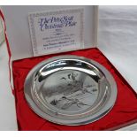 An Elizabeth II silver Peter Scott Christmas Plate 1972, decorated with ducks in flight, London,