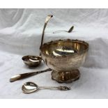 A George V silver pedestal bowl, with a pierced shaped rim, on a spreading similarly decorated base,