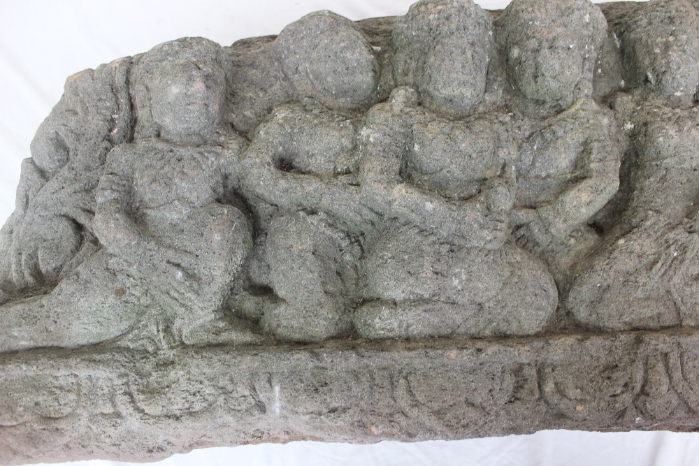 A carved reconstituted stone panel depicting Indian figures in a line on a lotus leaf carved base, - Image 5 of 5