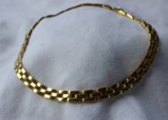 An 18ct yellow gold necklace with three rectangular links, approximately 72 grams, 37.