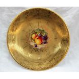 A Royal Worcester porcelain cabinet plate with raised gilt decoration painted to the centre with