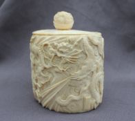 A late 19th / early 20th century Chinese carved ivory box and cover of oval form,