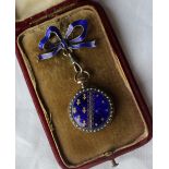 A French white metal, enamel and seed pearl decorated fob watch,