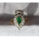 An emerald and diamond ring of heart shape,