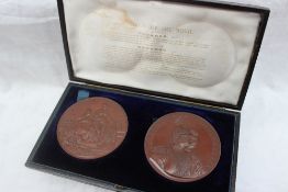 A pair of cased copper medallions produced "In commemoration of the visit of H.I.M.