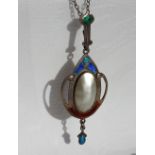 An Art Nouveau James Fenton & Co silver, pearl and enamel pendant Birmingham, 1908,