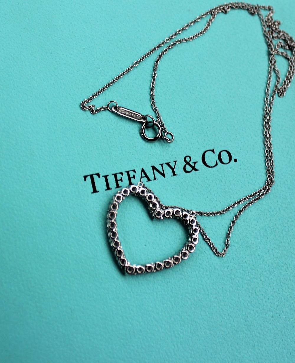 A Tiffany & Co. platinum large outline diamond set heart, approximately 0. - Image 2 of 3