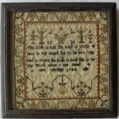 An 18th century sampler, with a floral swag border, decorated to the centre with a vase,