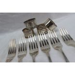 A set of six late George III silver table forks, London, 1789 or 1809,