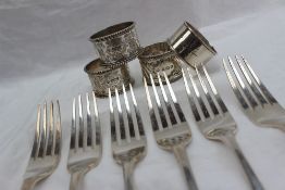 A set of six late George III silver table forks, London, 1789 or 1809,