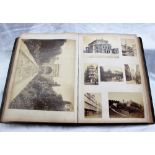 A bound album of photographs, including images of India, France, Germany,