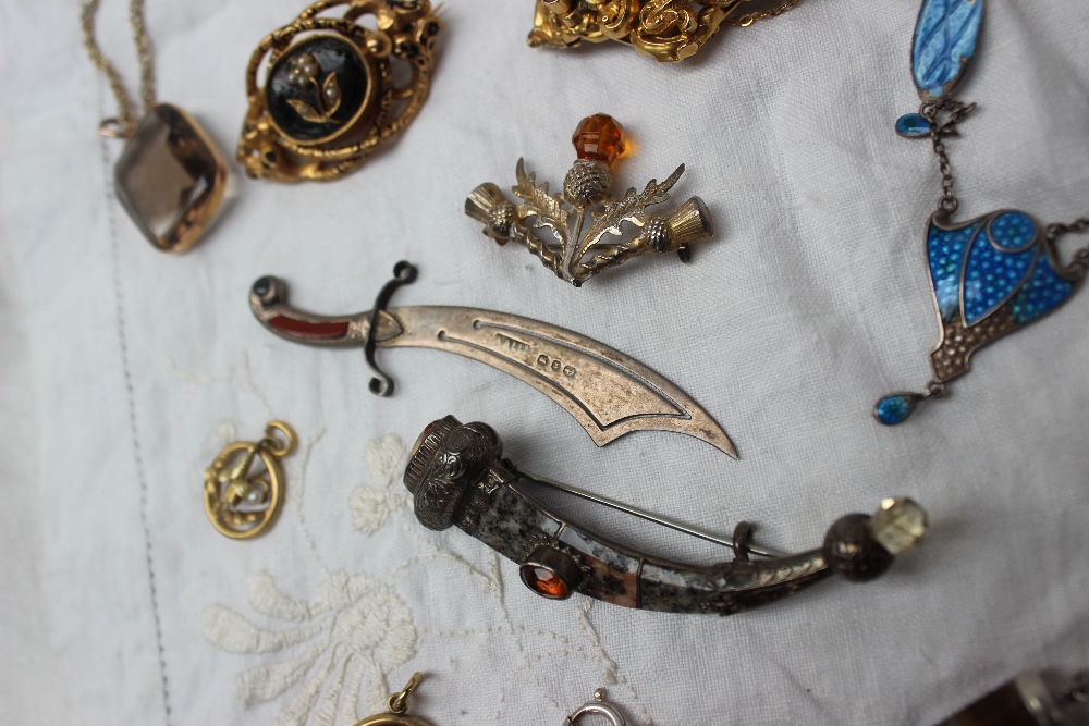 A Scottish hardstone set brooch together with a silver sword bookmark, - Image 2 of 3