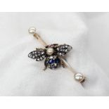 A sapphire, diamond and ruby bar brooch, in the form of a Bee, set with rose cut diamonds,