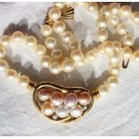 A pearl necklace,