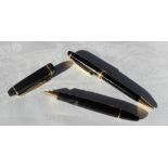 A Montblanc Meisterstuck fountain pen, with a black body and yellow 14k gold nib,