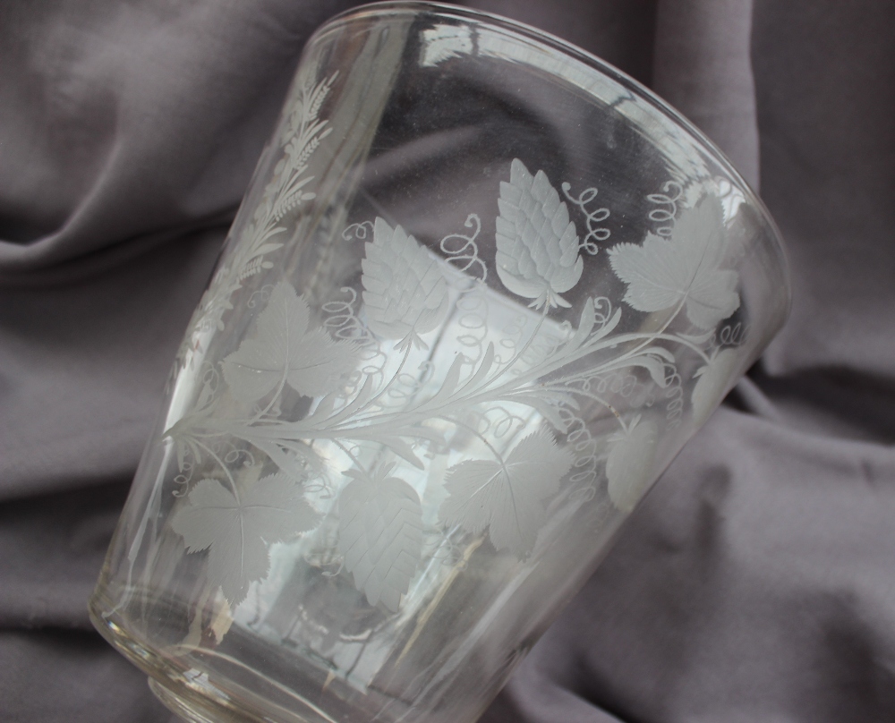 A 19th century oversize drinking glass, the flared bowl engraved with vine leaves and hops, - Image 2 of 5