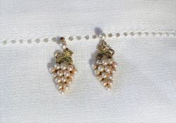 A pair of 9ct yellow gold and seed pearl earrings,