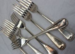 A set of six late Victorian silver bead decorated table forks, London, 1892,