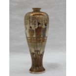 A Japanese Satsuma pottery vase, decorated with figures on a bridge under cherry blossom trees,