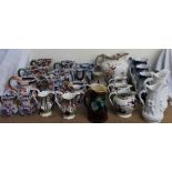 A collection of Masons stoneware jugs,