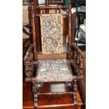 A child's American rocking chair with upholstered back and seat