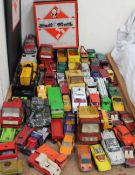 A collection of Corgi cars, tonka toys, Monopoly set,