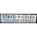 An aluminium street sign for "Stryd-y-Coleg",