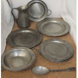 A collection of "Tin Exclusief" plates, bowls,