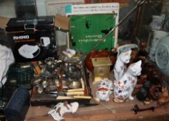 Assorted flatwares together with pottery cats, brass carriage clock,