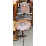 A Singer sewing machine treadle table, fitted with a sewing machine together with a coal purdonium,
