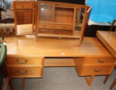 A G-plan teak wardrobe and dressing table