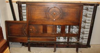 An oak double head and foot board