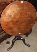 A George III mahogany tripod table,