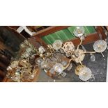 A brass five branch chandelier together with other chandeliers, wall lights, hardstone owl,