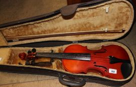 An Osztreicher violin bow and case dated 1990