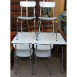 A 1950s/60s kitchen table and four chairs