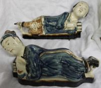 A pair of Japanese stoneware figural pillows