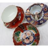 A Japanese porcelain tea cup and saucer together with an Imari tea bowl,