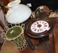 A postmans wall clock together with a hanging oil lamp etc