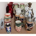 Three Wade liqueur barrels together with steins, glass candlesticks, figures, lamps,