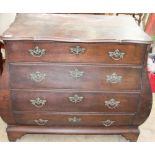 A 20th century Dutch oak bombe commode with a serpentine top above four long drawers and bracket