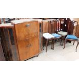 A 20th century walnut cocktail/ display cabinet together with a nest of three tables and three