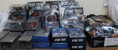 A collection of batman models, Star trek models,