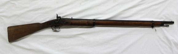 A 19th century walnut and steel percussion rifle, with a 114cm steel barrel and ramrod,