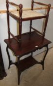 An Edwardian mahogany piano stool with spindle turned handles and legs together with an occasional