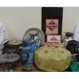 Two glass lamp shades together with pottery jugs, silk scarves, clock,